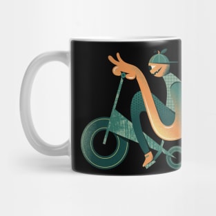 Halloween monster on a bicycle Mug